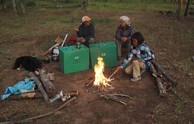 Dona and Zia starting a fire