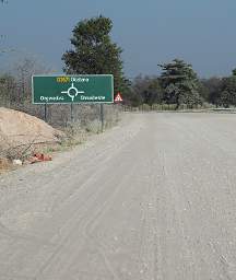 Dirt Road with Fancy Sign