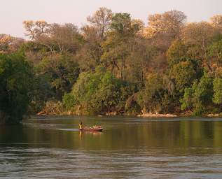 Popa Falls Man In Boat