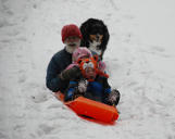 Gary, Dylan and Mya Sledding