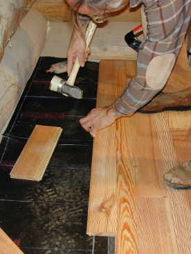 Tapping the board with biscuit in place